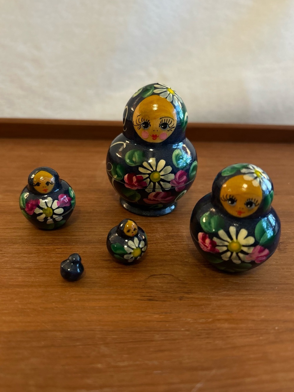 Vintage Hand-Painted Nesting Dolls Set of 5 in Dark Blue with Floral Motifs
